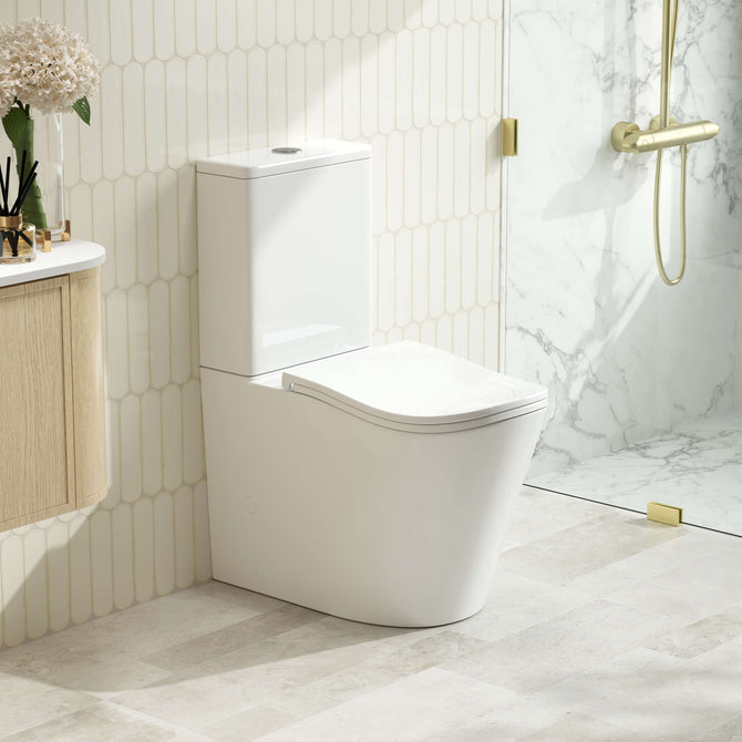 Fifa tornado rimless back to wall toilet suite with slim soft close seat